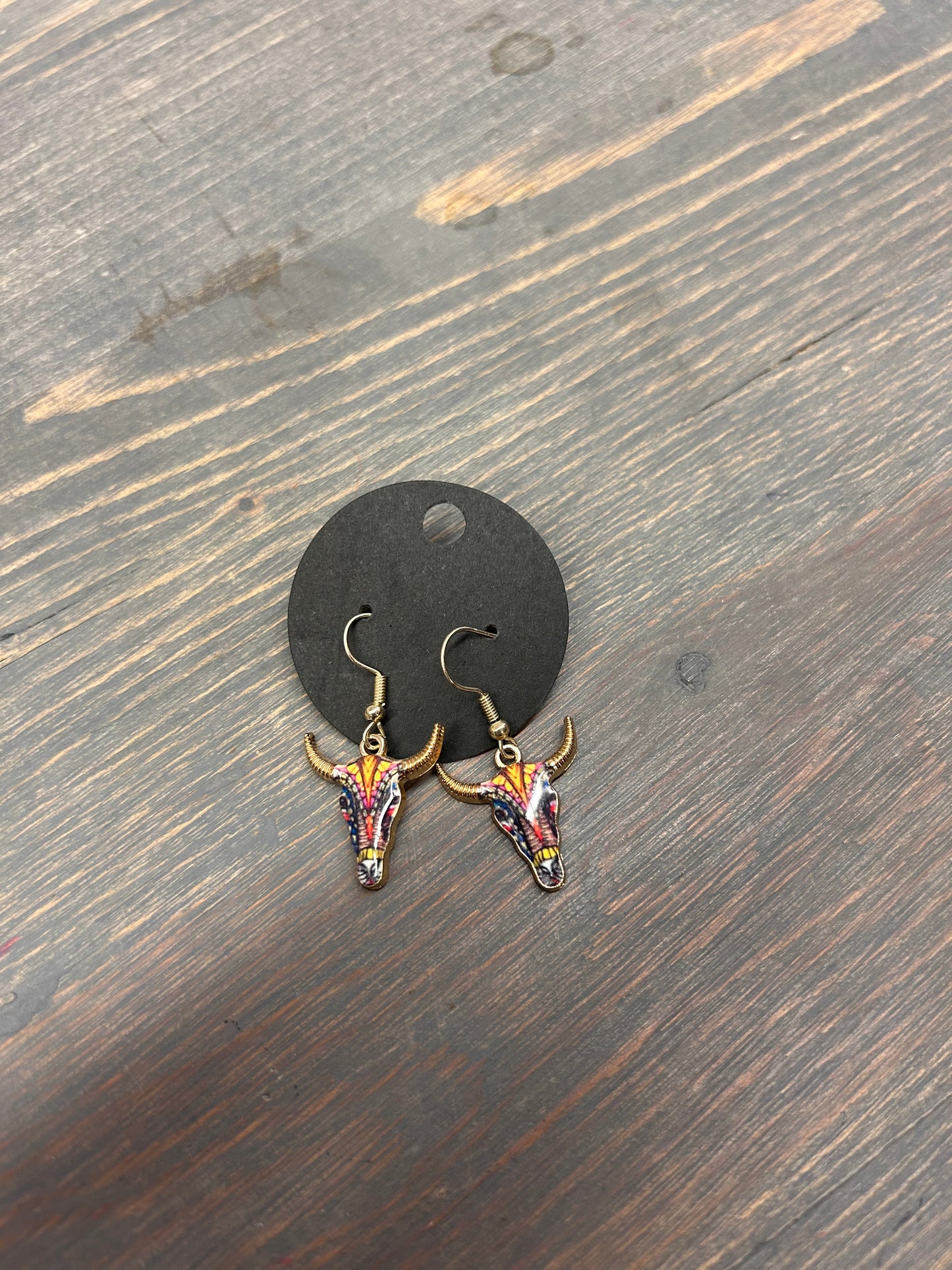 Multicoloured skull earrings