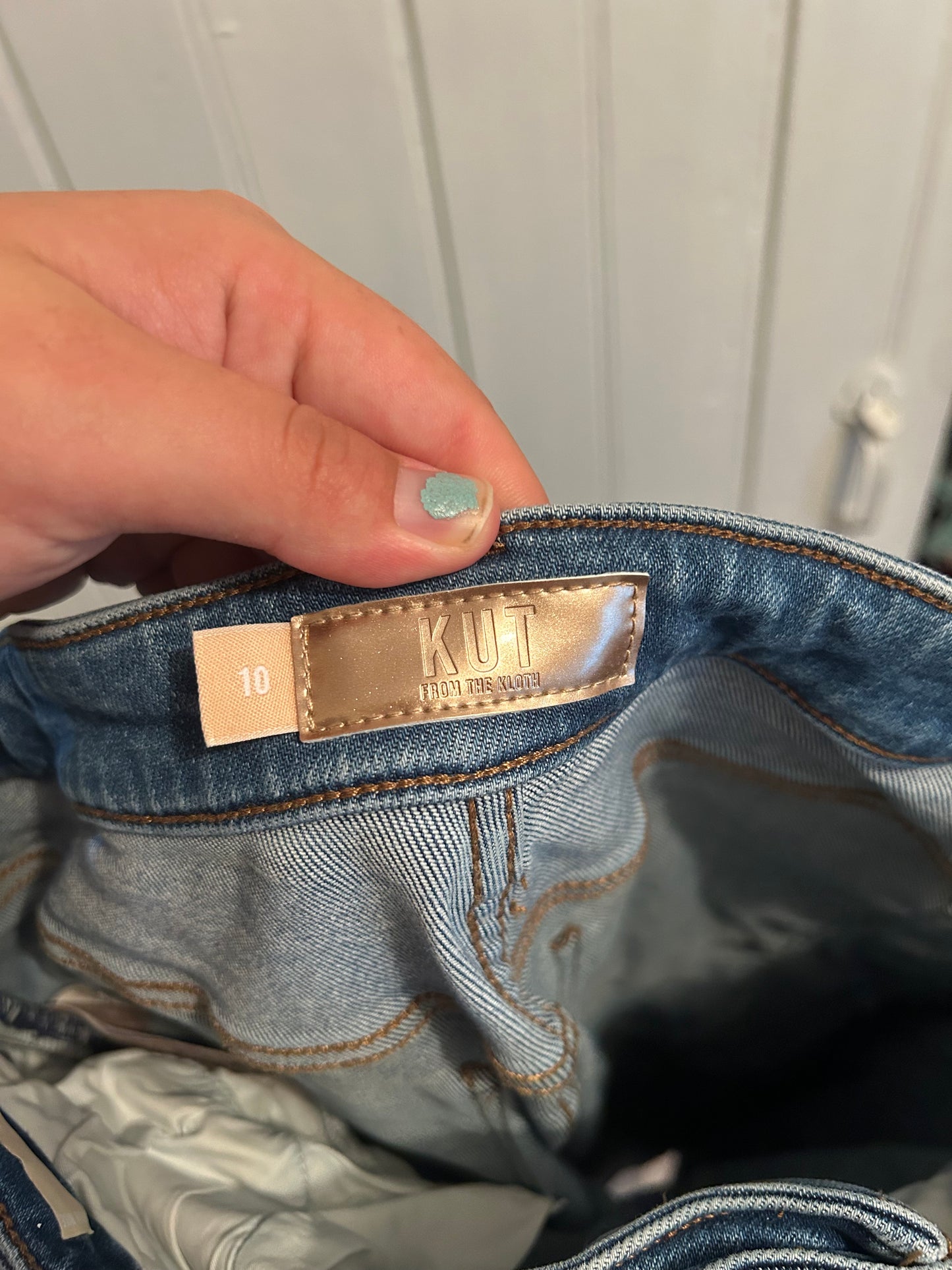 Kut from the Kloth 10 light wash button up skinny jeans