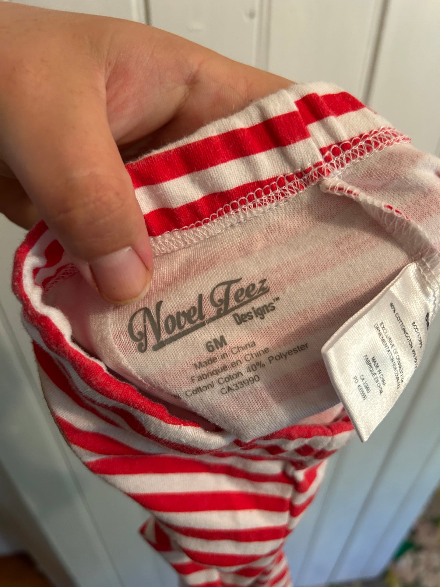 Novel tees 6m red striped Santa footed pants