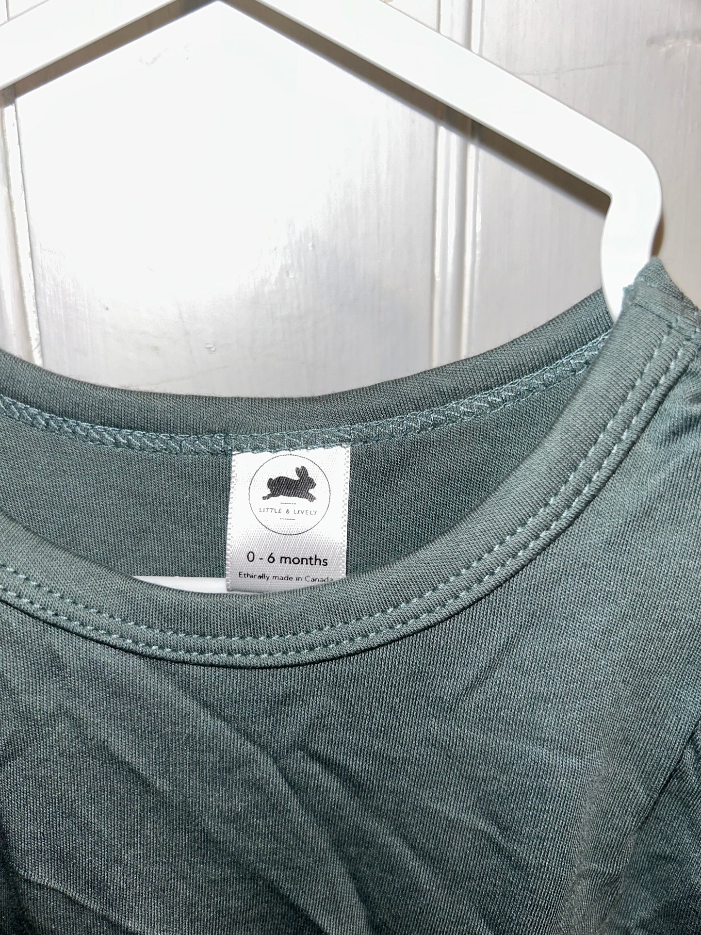 Little & lively 0/6m green peplum top