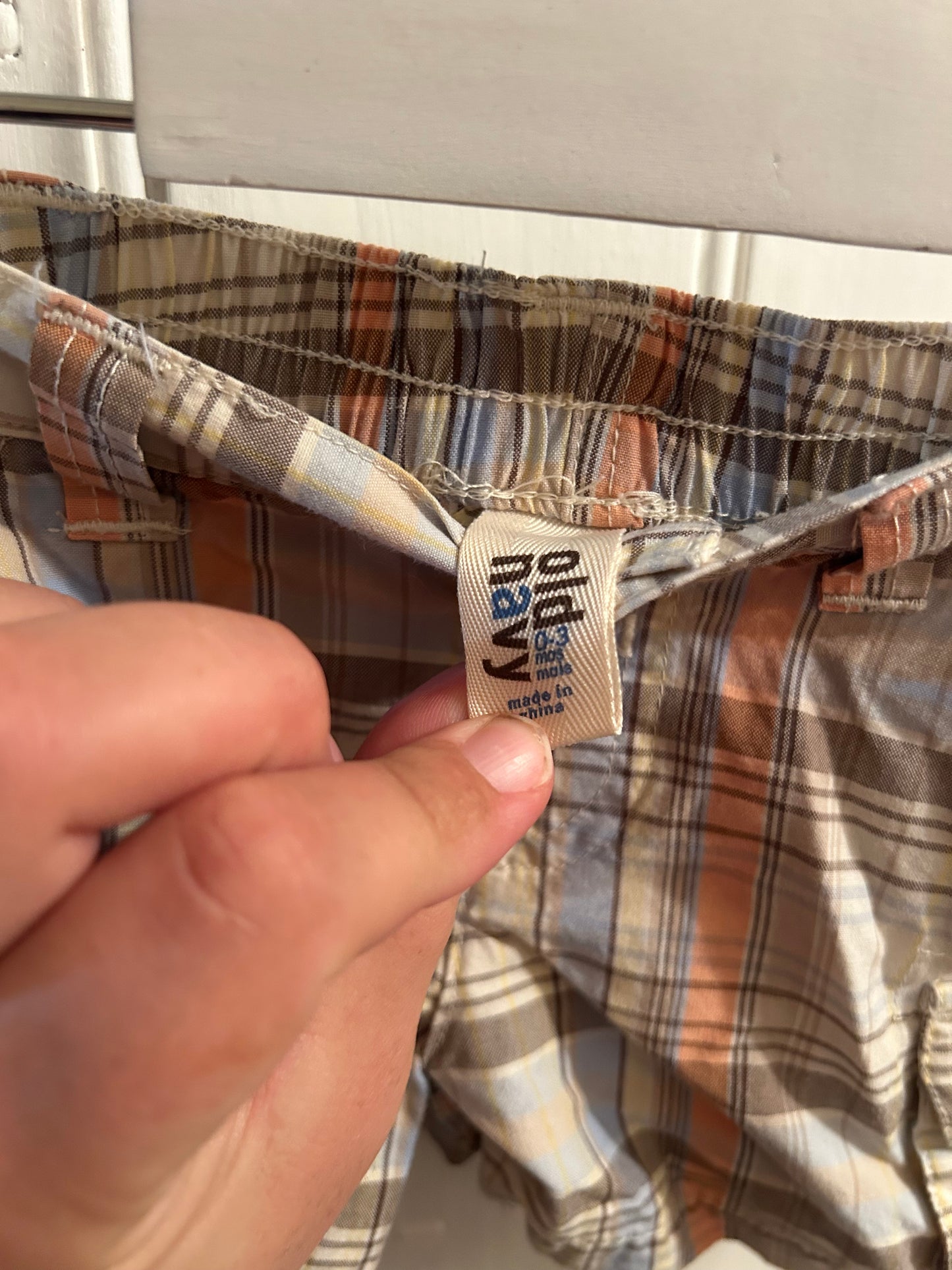 Old navy 0/3m tan, orange & blue plaid shorts