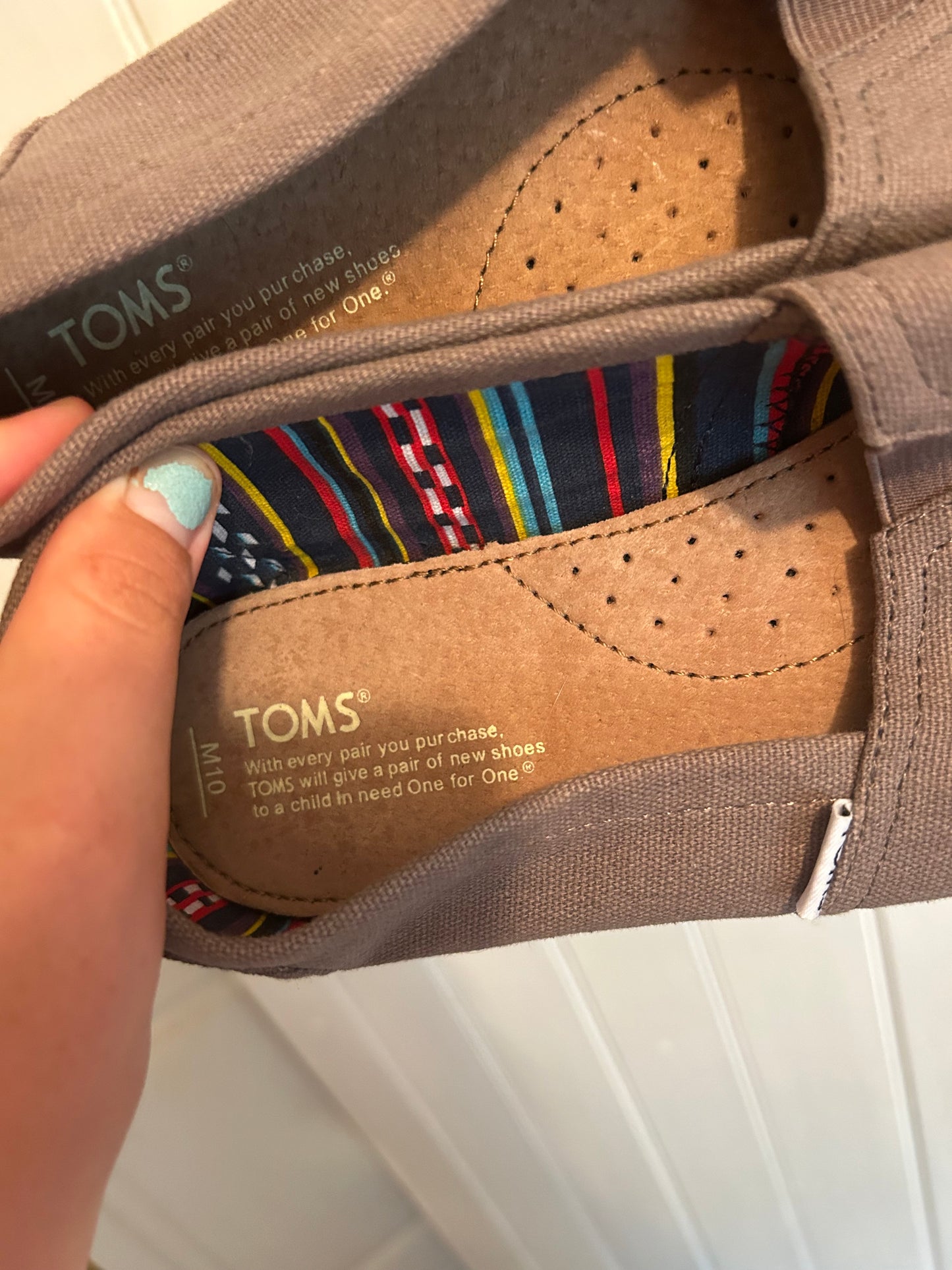Tom’s men’s 10 grey slip on shoes