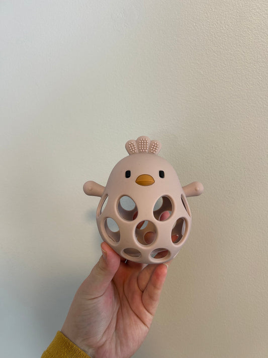 Pink chicken teether toy