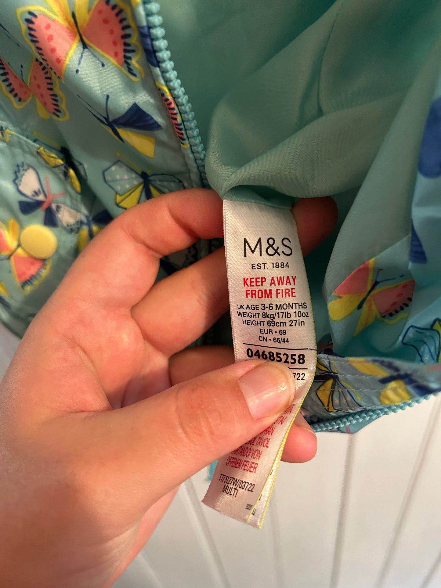 M&S 3/6m butterfly rain jacket