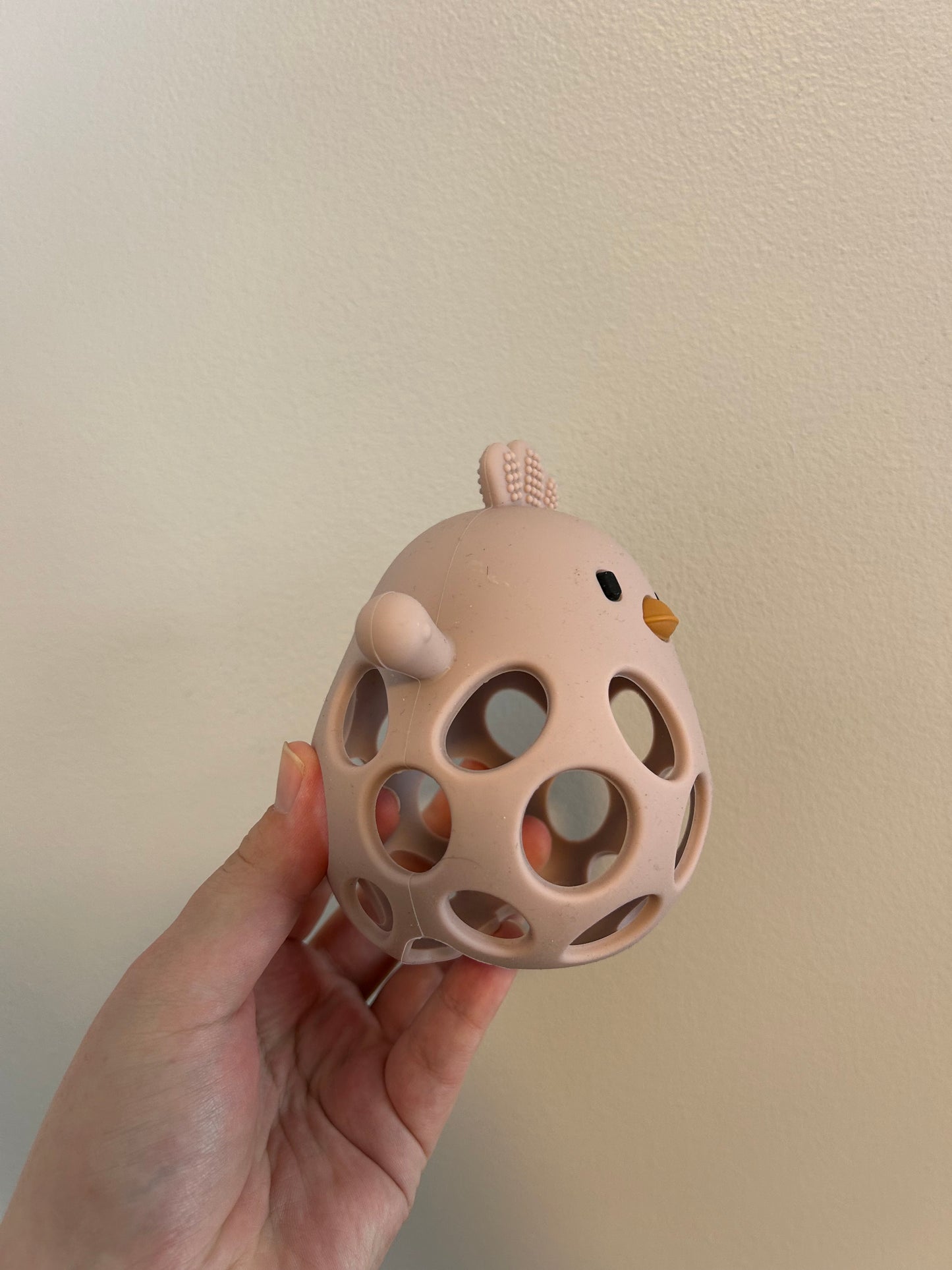 Pink chicken teether toy