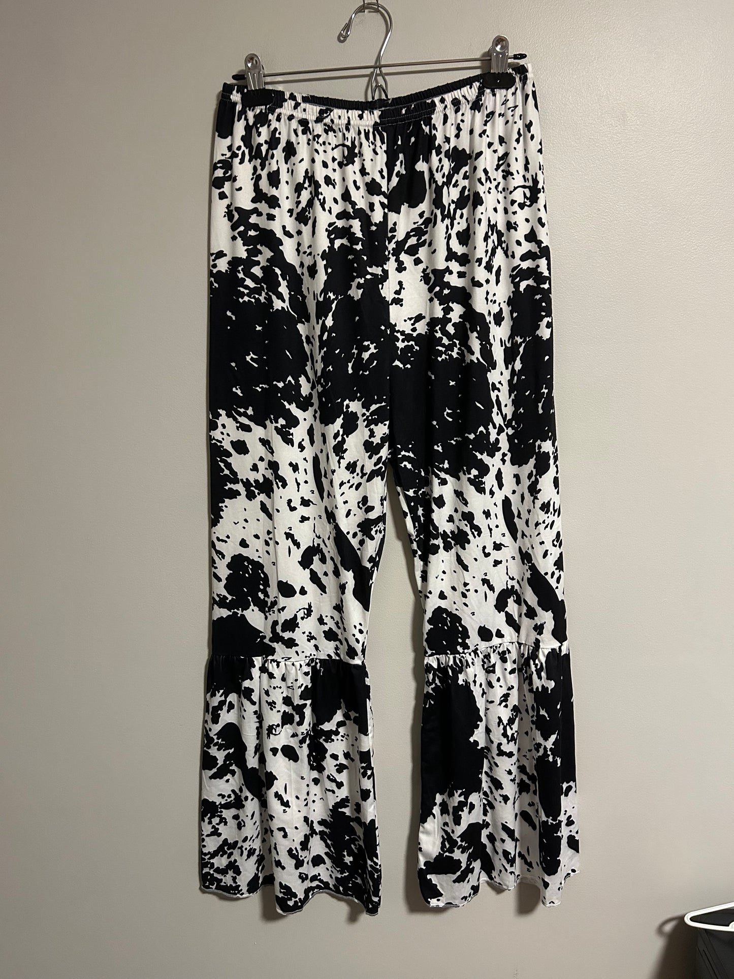 Small shop xl cow print bell bottoms
