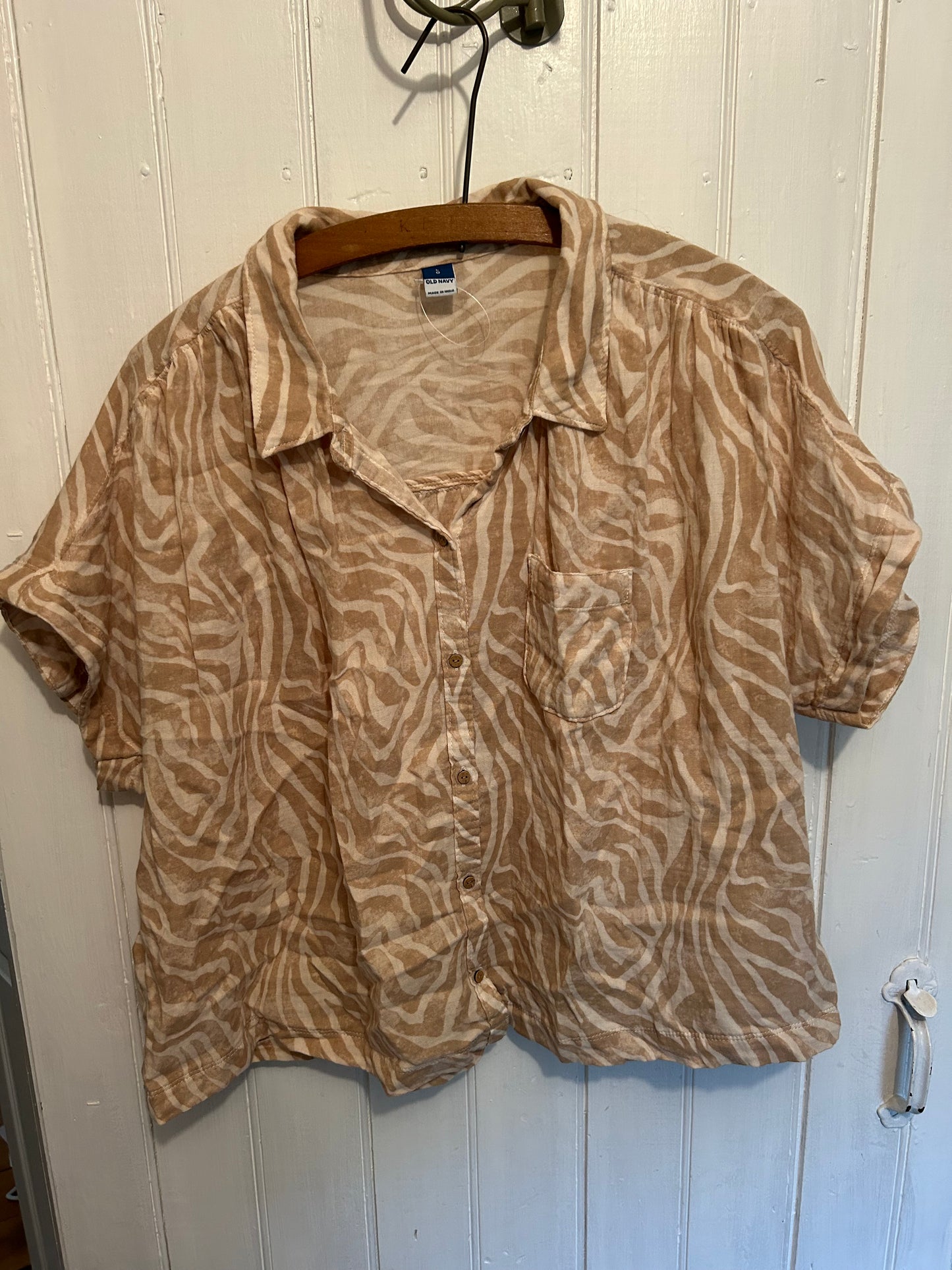 Old navy large tan zebra like button up top